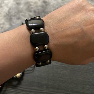 Black Beaded Stretch Bracelet might be stone or glass